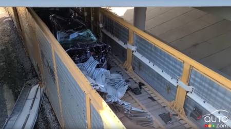 A destroyed car in one of the train cars